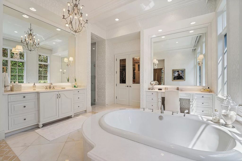 The Home in Palm Beach Gardens is a signature custom estate with amazing views and outdoor entertainment areas now available for sale. This house located at 11770 Calleta Ct, Palm Beach Gardens, Florida