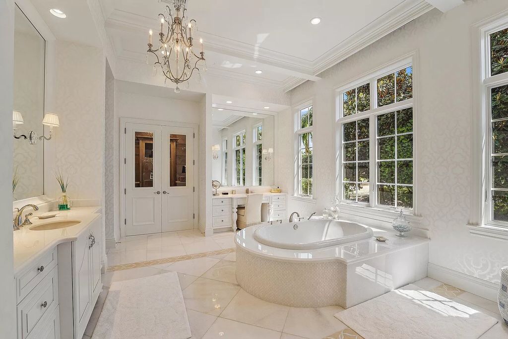 The Home in Palm Beach Gardens is a signature custom estate with amazing views and outdoor entertainment areas now available for sale. This house located at 11770 Calleta Ct, Palm Beach Gardens, Florida