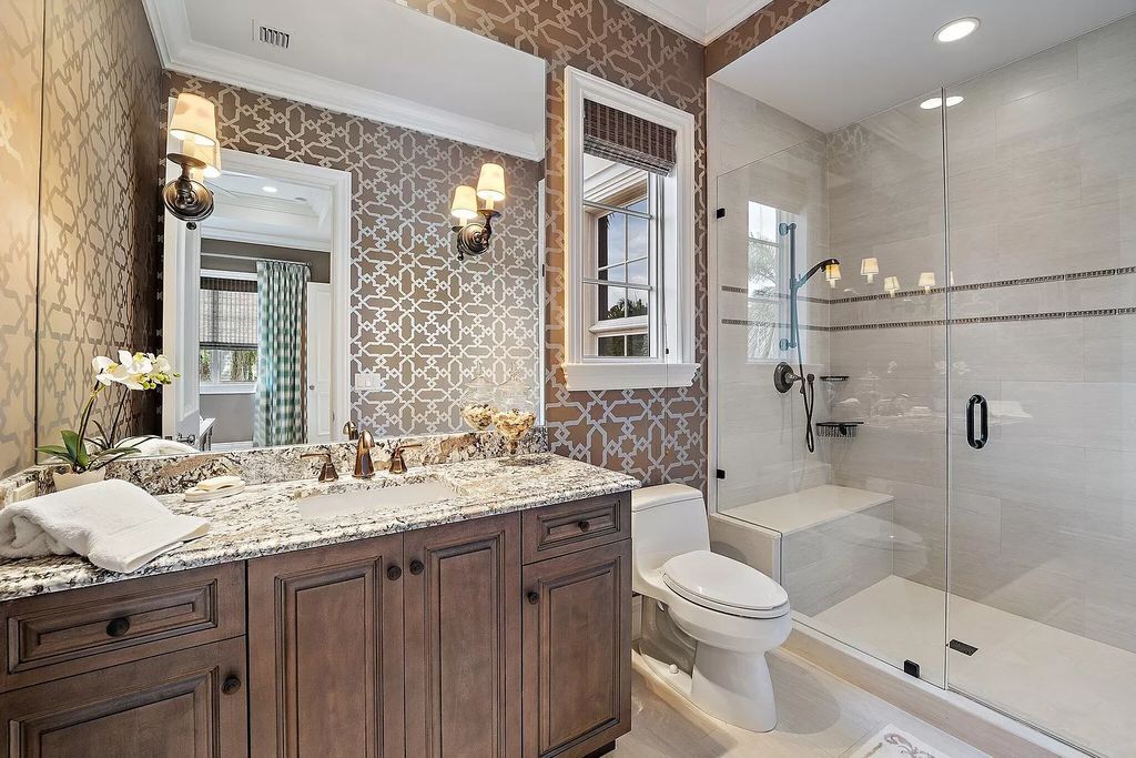 The Home in Palm Beach Gardens is a signature custom estate with amazing views and outdoor entertainment areas now available for sale. This house located at 11770 Calleta Ct, Palm Beach Gardens, Florida
