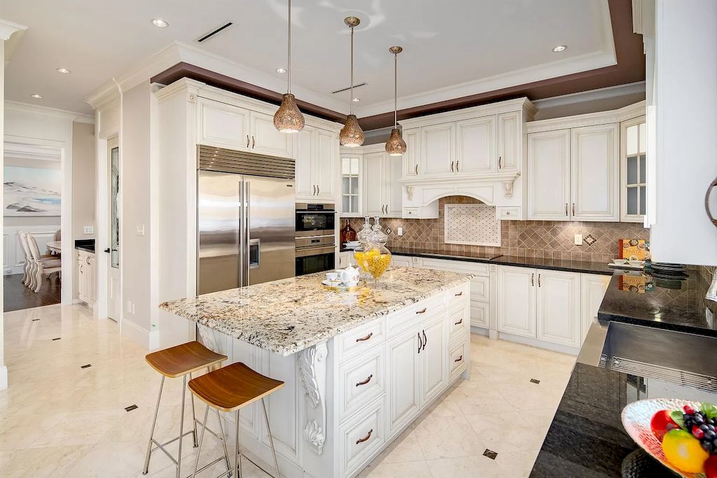 The House in Richmond has spacious living spaces and top line of workmanship and materials, now available for sale. This home located at 7980 Goldstream Pl, Richmond, BC V7A 1L7, Canada