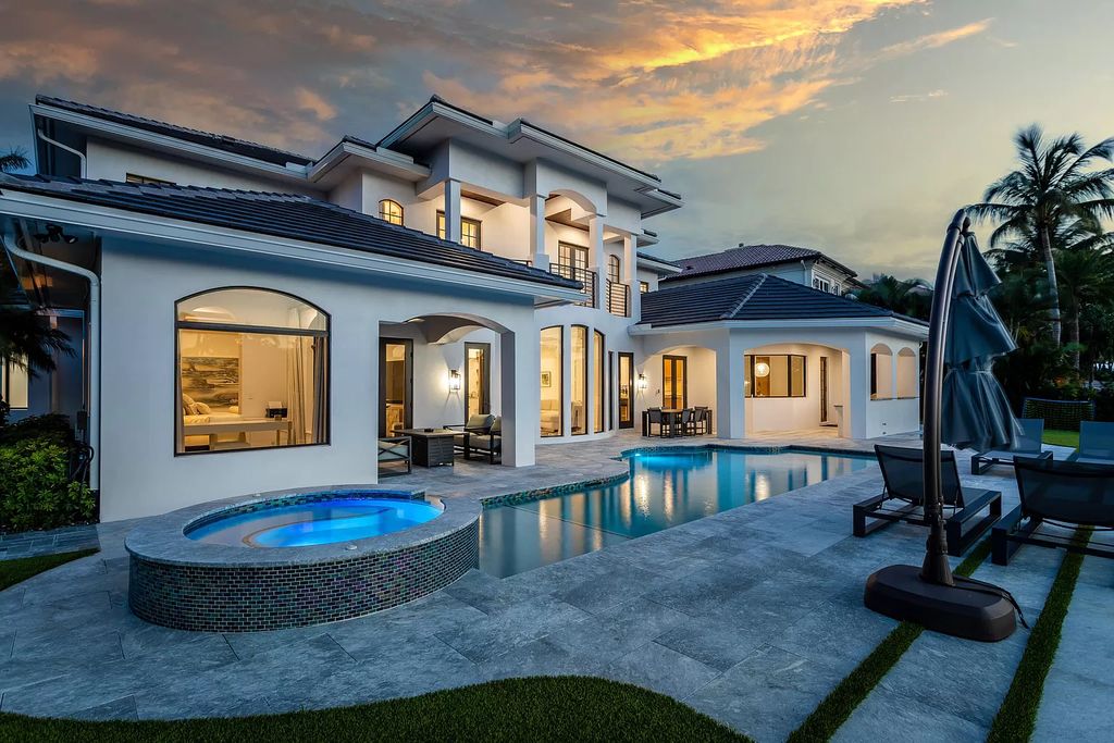 The Home in Boca Raton is a Two story Transitional Contemporary with exceptional water and expansive golf course vistas of the Fazio west golf course now available for sale. This home located at 7645 Fenwick Pl, Boca Raton, Florida