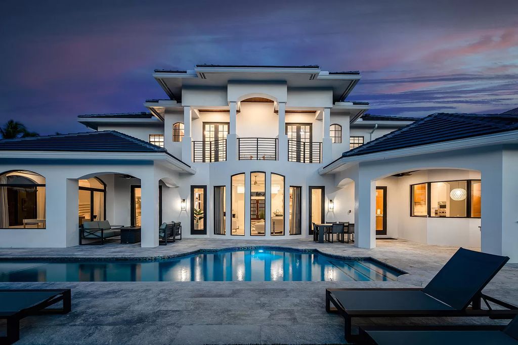 The Home in Boca Raton is a Two story Transitional Contemporary with exceptional water and expansive golf course vistas of the Fazio west golf course now available for sale. This home located at 7645 Fenwick Pl, Boca Raton, Florida