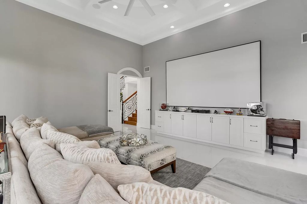 The Home in Boca Raton is a Two story Transitional Contemporary with exceptional water and expansive golf course vistas of the Fazio west golf course now available for sale. This home located at 7645 Fenwick Pl, Boca Raton, Florida