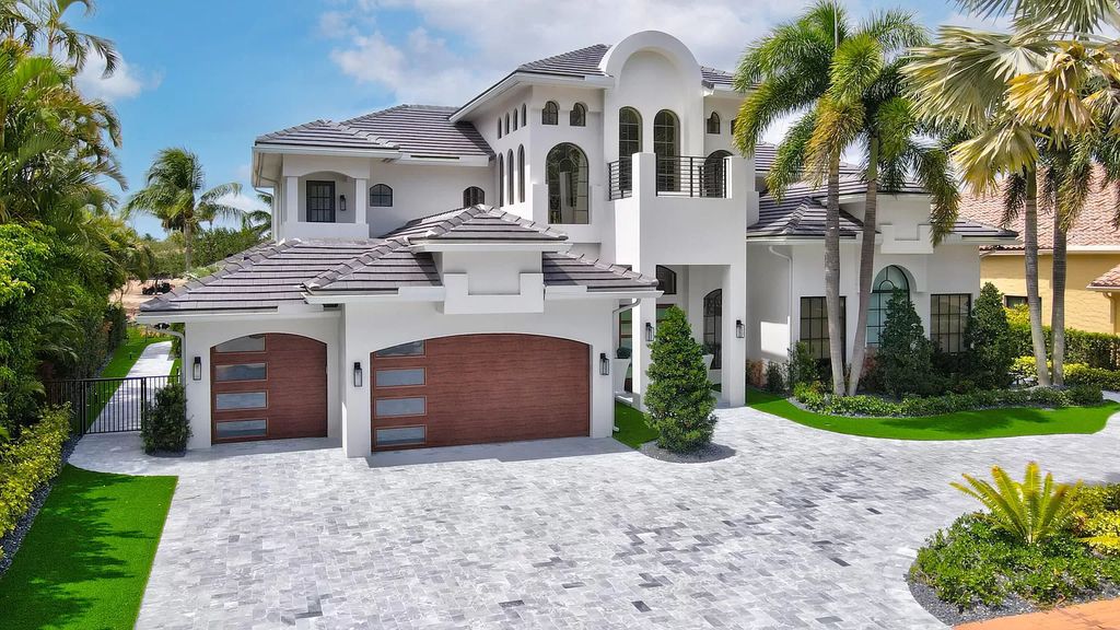 The Home in Boca Raton is a Two story Transitional Contemporary with exceptional water and expansive golf course vistas of the Fazio west golf course now available for sale. This home located at 7645 Fenwick Pl, Boca Raton, Florida