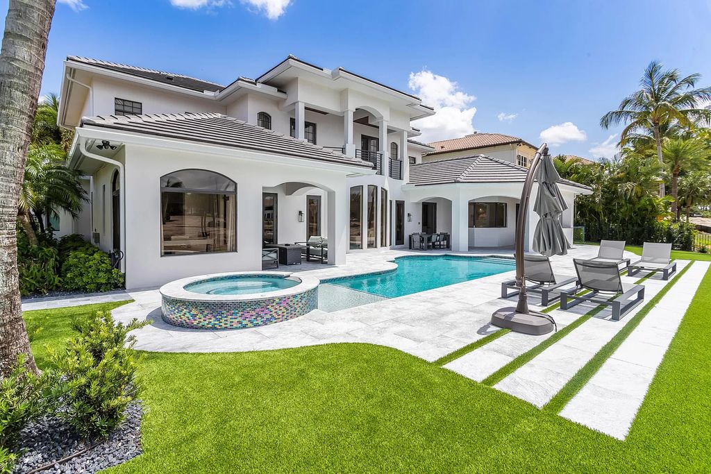 The Home in Boca Raton is a Two story Transitional Contemporary with exceptional water and expansive golf course vistas of the Fazio west golf course now available for sale. This home located at 7645 Fenwick Pl, Boca Raton, Florida