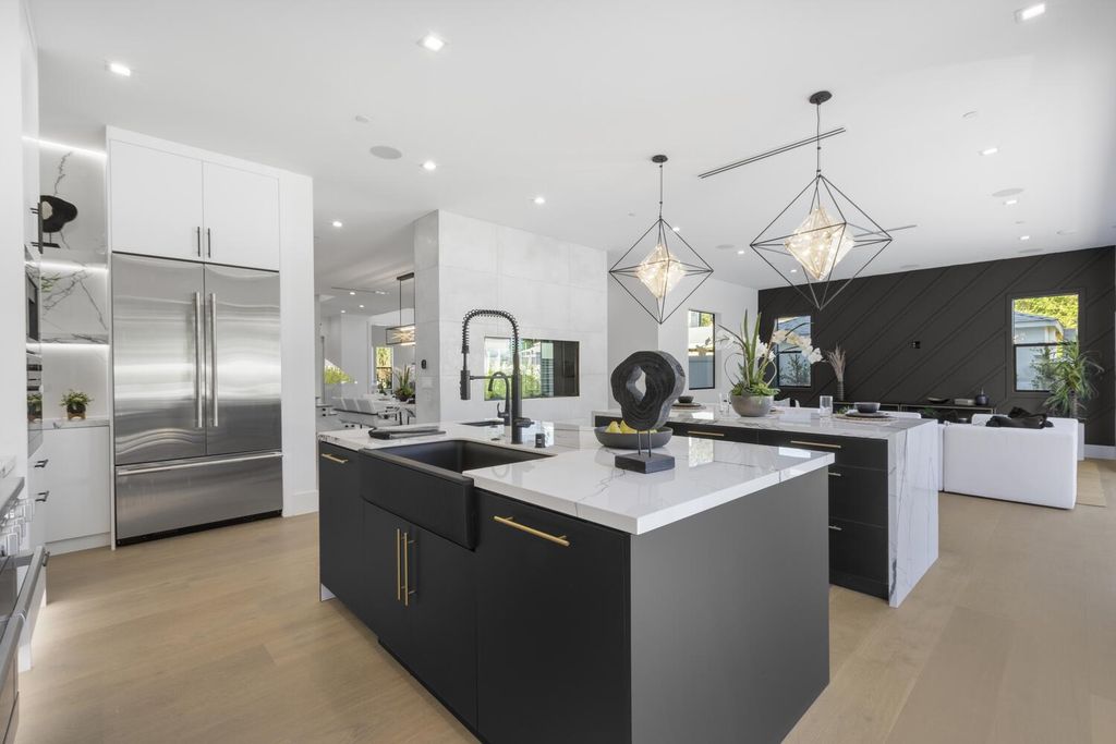 The Home in Encino is a brilliantly designed contemporary residence offers warm, indoor outdoor living with luxurious finishes now available for sale. This home located at 16706 Magnolia, Encino, California
