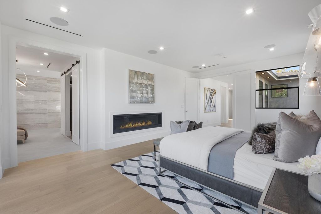The Home in Encino is a brilliantly designed contemporary residence offers warm, indoor outdoor living with luxurious finishes now available for sale. This home located at 16706 Magnolia, Encino, California