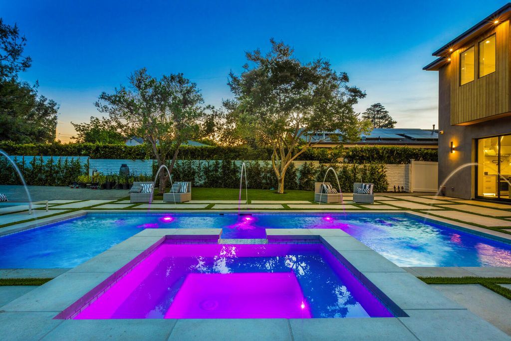 The Home in Encino is a brilliantly designed contemporary residence offers warm, indoor outdoor living with luxurious finishes now available for sale. This home located at 16706 Magnolia, Encino, California