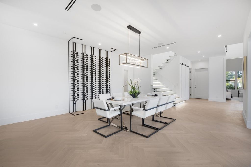 The Home in Encino is a brilliantly designed contemporary residence offers warm, indoor outdoor living with luxurious finishes now available for sale. This home located at 16706 Magnolia, Encino, California