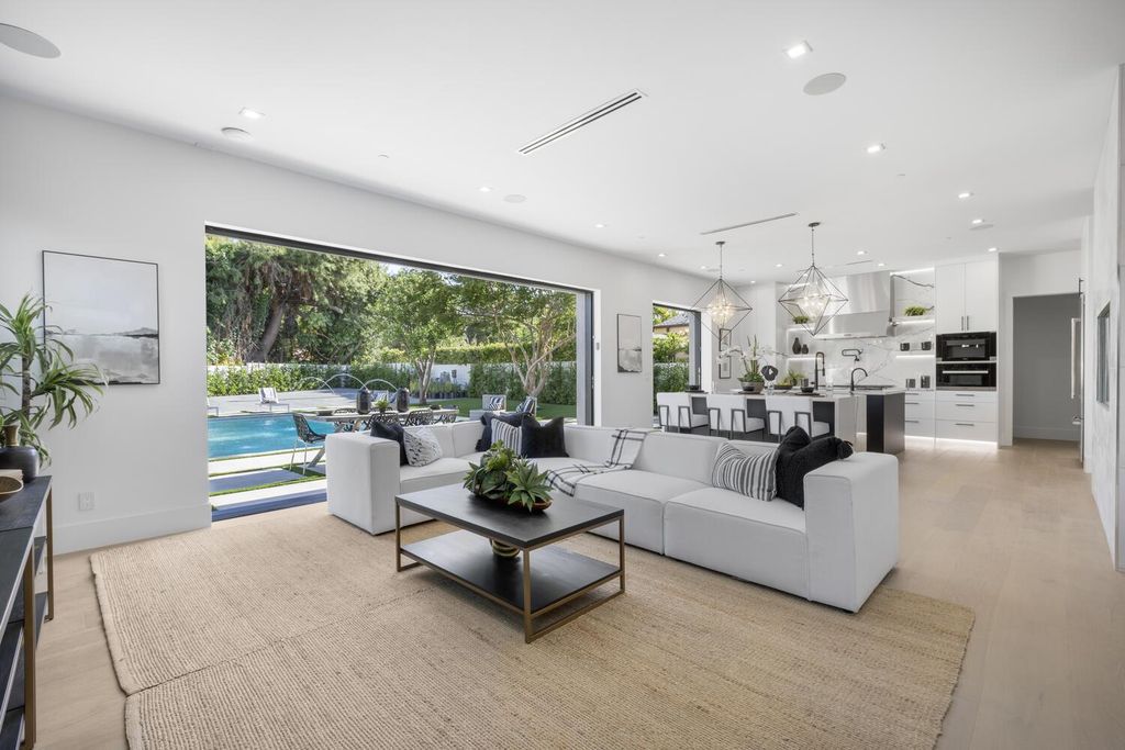 The Home in Encino is a brilliantly designed contemporary residence offers warm, indoor outdoor living with luxurious finishes now available for sale. This home located at 16706 Magnolia, Encino, California