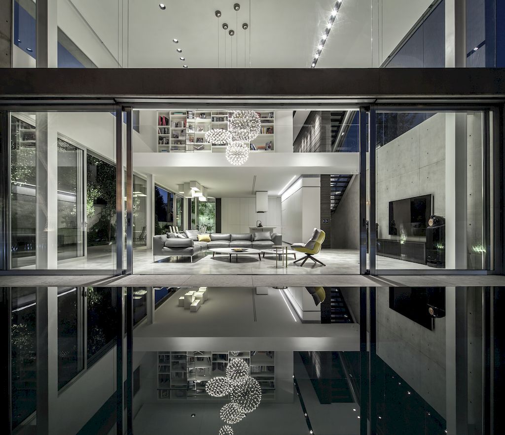 Concrete Cut house a Home of Concrete and Glass by Pitsou Kedem 27