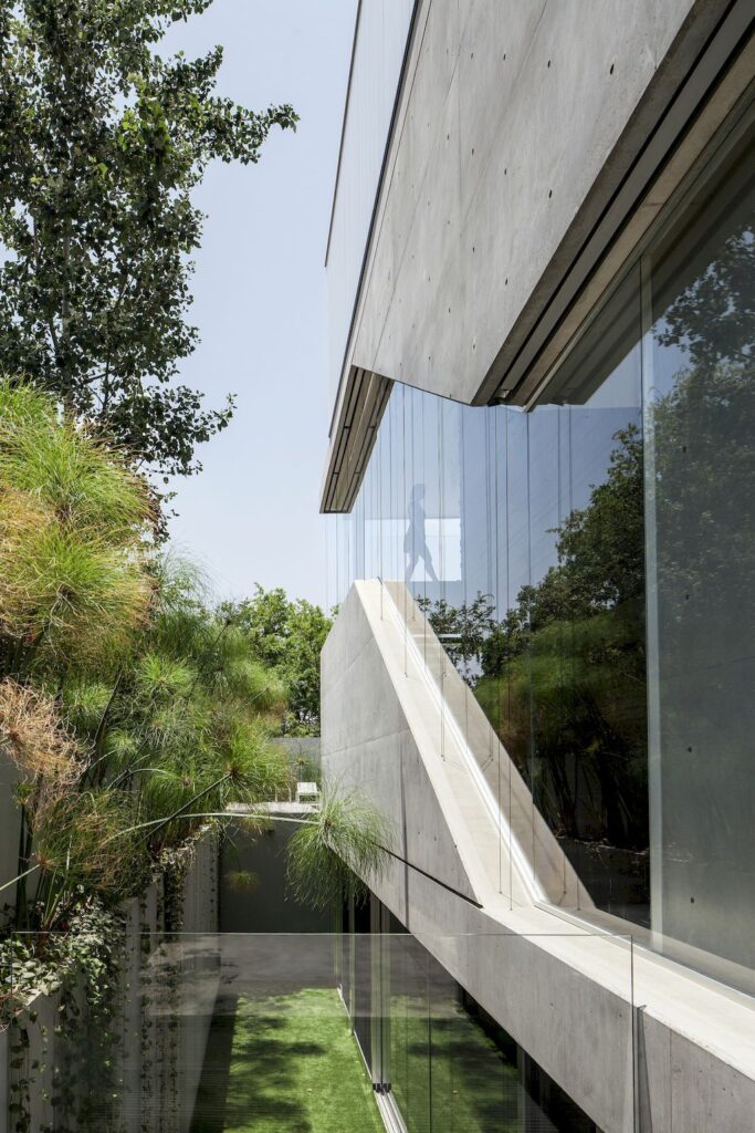 Concrete Cut house a Home of Concrete and Glass by Pitsou Kedem 5