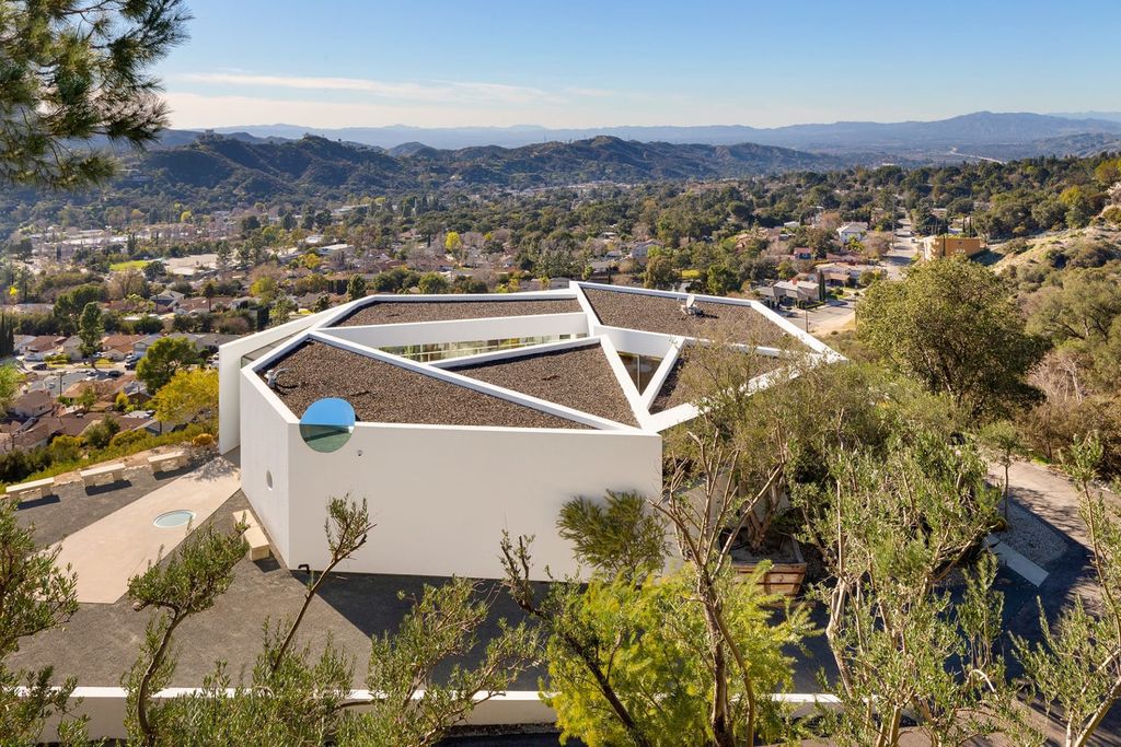 The Home in La Crescenta is an exceptional architectural compound occupies an extraordinary 5.7 acre curated succulent garden now available for sale. This home located at 3947 Markridge Rd, La Crescenta, California