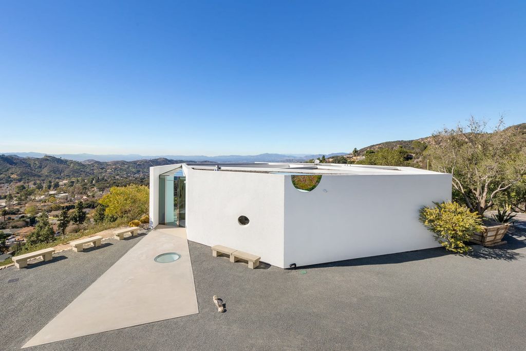 The Home in La Crescenta is an exceptional architectural compound occupies an extraordinary 5.7 acre curated succulent garden now available for sale. This home located at 3947 Markridge Rd, La Crescenta, California