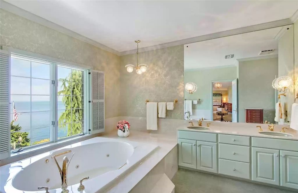 The Estate in Washington is a luxurious home located amongst mature gardens and majestic evergreens now available for sale. This home located at 17802 Talbot Rd, Edmonds, Washington; offering 04 bedrooms and 05 bathrooms with 8,200 square feet of living spaces.