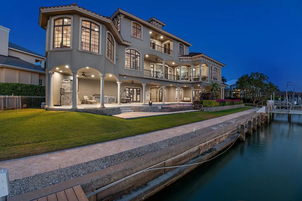 The Villa in Marco Island is a Mediterranean estate on a key lot offering direct access, with western exposure for spectacular sunsets now available for sale. This home located at 950 Giralda Ct, Marco Island, Florida