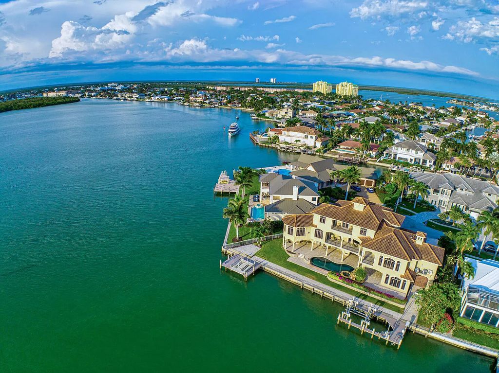 The Villa in Marco Island is a Mediterranean estate on a key lot offering direct access, with western exposure for spectacular sunsets now available for sale. This home located at 950 Giralda Ct, Marco Island, Florida