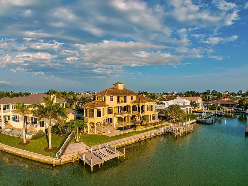 The Villa in Marco Island is a Mediterranean estate on a key lot offering direct access, with western exposure for spectacular sunsets now available for sale. This home located at 950 Giralda Ct, Marco Island, Florida