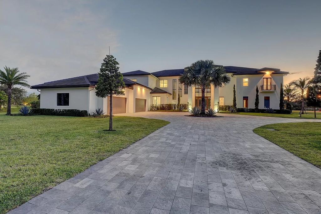 The Home in Delray Beach is a New custom furnished luxury estate situated on 2 acres of land with one of the best lake front lots now available for sale. This home located at 10540 El Paraiso Pl, Delray Beach, Florida