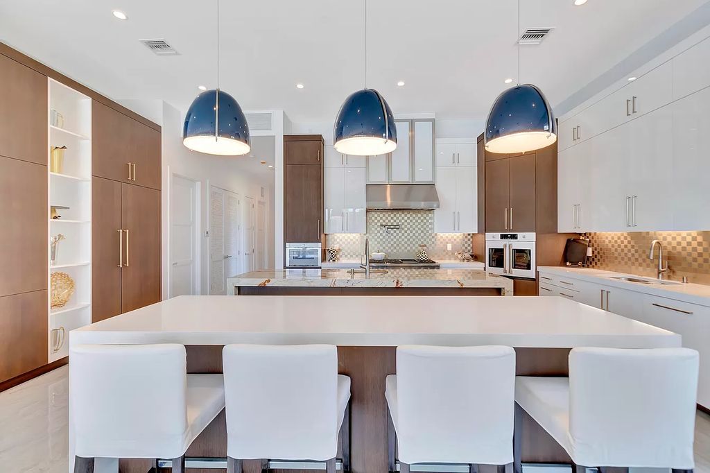 The Home in Delray Beach is a New custom furnished luxury estate situated on 2 acres of land with one of the best lake front lots now available for sale. This home located at 10540 El Paraiso Pl, Delray Beach, Florida