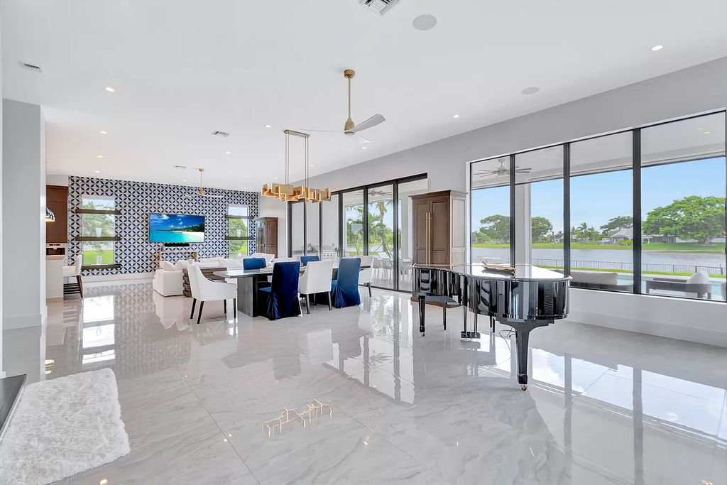 The Home in Delray Beach is a New custom furnished luxury estate situated on 2 acres of land with one of the best lake front lots now available for sale. This home located at 10540 El Paraiso Pl, Delray Beach, Florida