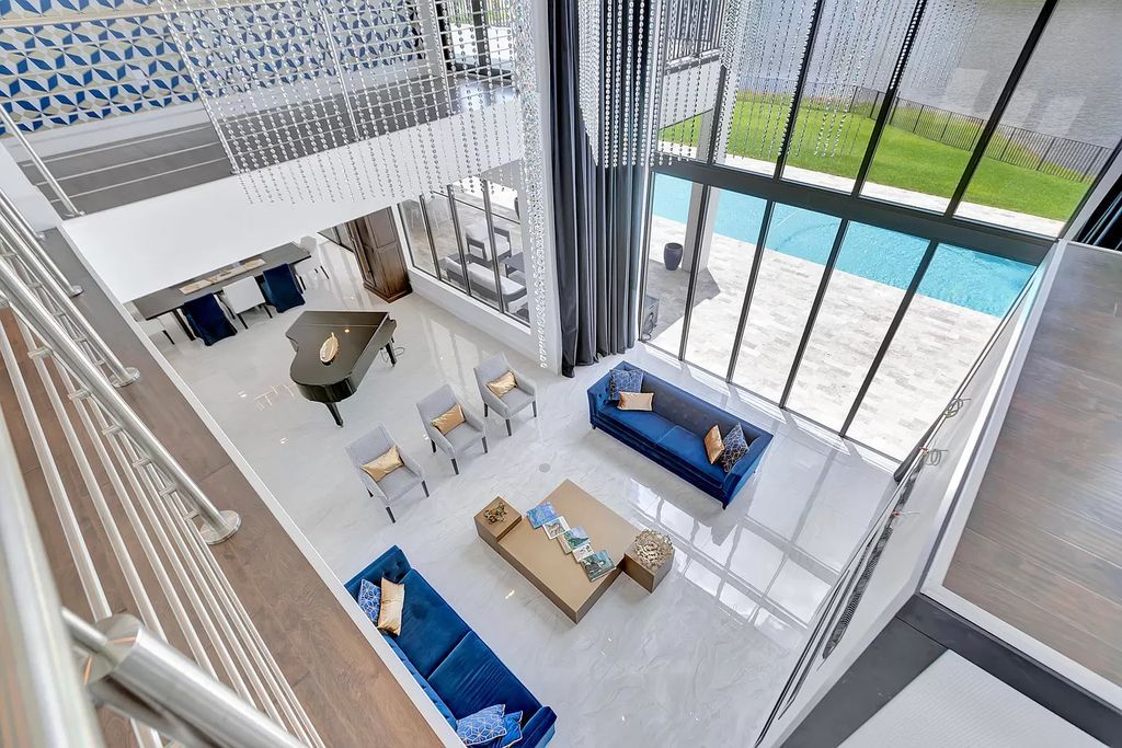 The Home in Delray Beach is a New custom furnished luxury estate situated on 2 acres of land with one of the best lake front lots now available for sale. This home located at 10540 El Paraiso Pl, Delray Beach, Florida