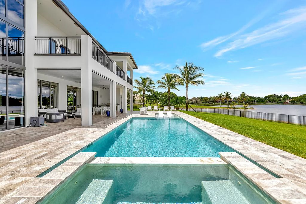 The Home in Delray Beach is a New custom furnished luxury estate situated on 2 acres of land with one of the best lake front lots now available for sale. This home located at 10540 El Paraiso Pl, Delray Beach, Florida