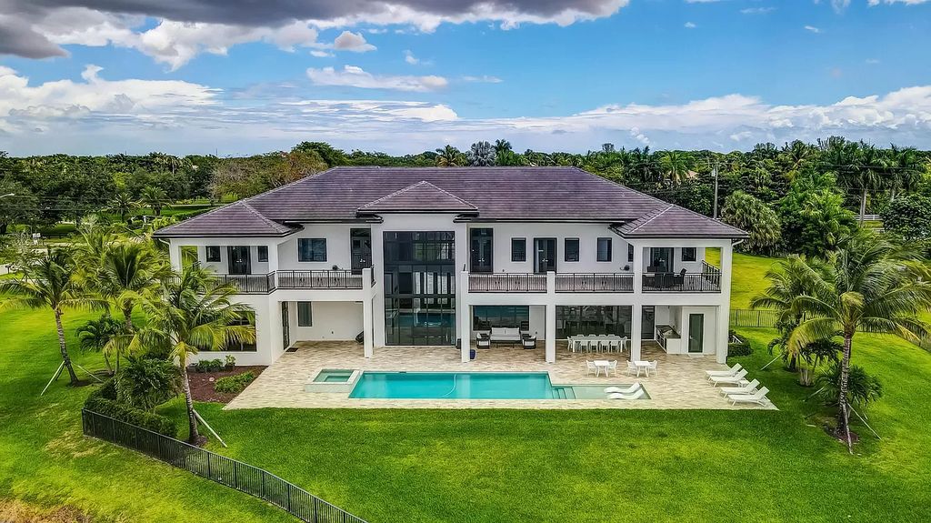 The Home in Delray Beach is a New custom furnished luxury estate situated on 2 acres of land with one of the best lake front lots now available for sale. This home located at 10540 El Paraiso Pl, Delray Beach, Florida