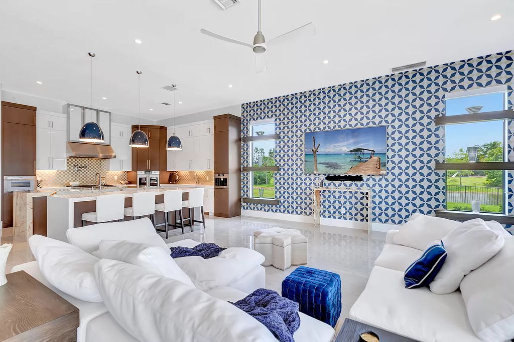 The Home in Delray Beach is a New custom furnished luxury estate situated on 2 acres of land with one of the best lake front lots now available for sale. This home located at 10540 El Paraiso Pl, Delray Beach, Florida