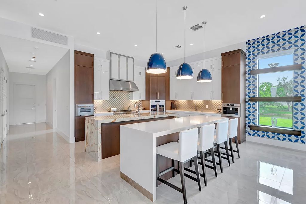 The Home in Delray Beach is a New custom furnished luxury estate situated on 2 acres of land with one of the best lake front lots now available for sale. This home located at 10540 El Paraiso Pl, Delray Beach, Florida