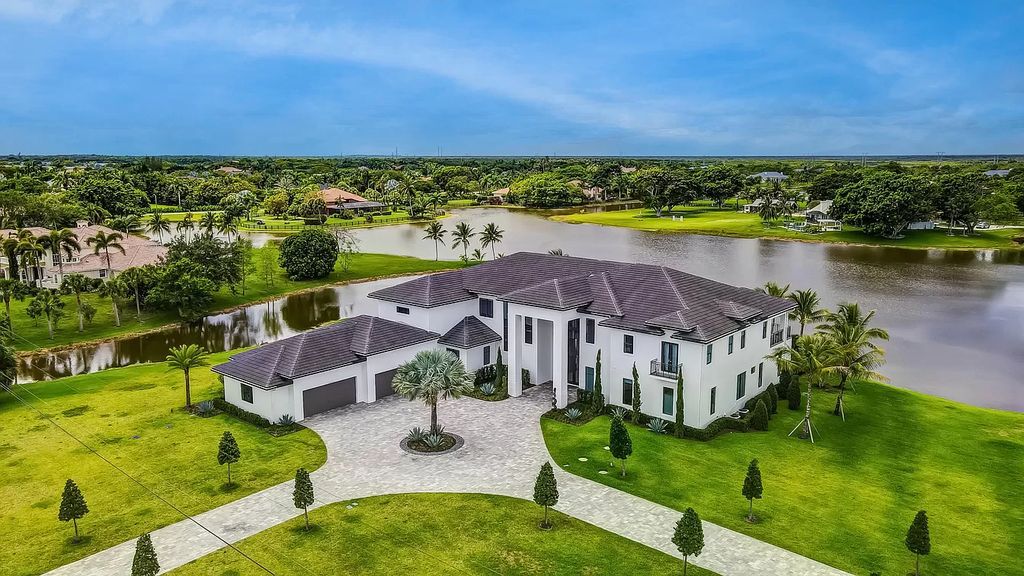 The Home in Delray Beach is a New custom furnished luxury estate situated on 2 acres of land with one of the best lake front lots now available for sale. This home located at 10540 El Paraiso Pl, Delray Beach, Florida
