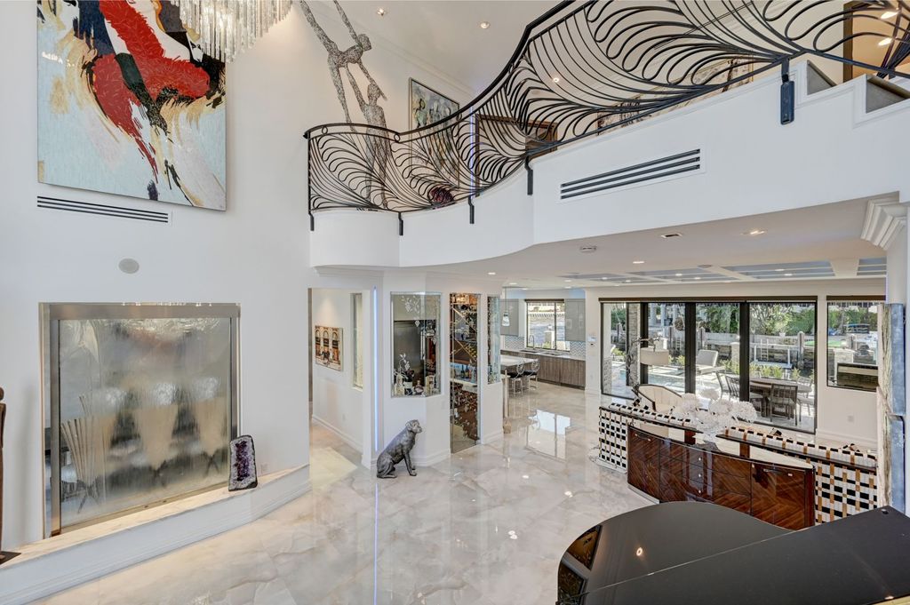 The Home in Boca Raton is a new waterfront home on the edge of the intracoastal with highest level of Furniture and art work now available for sale. This home located at 2900 NE 8th Ave, Boca Raton, Florida