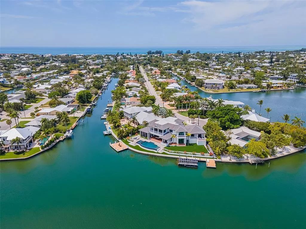 The Home in Holmes Beach is a luxurious, sprawling waterfront front estate tucked away at the end of a quiet cul de sac on desirable Anna Maria Island now available for sale. This home located at 535 70th St, Holmes Beach, Florida