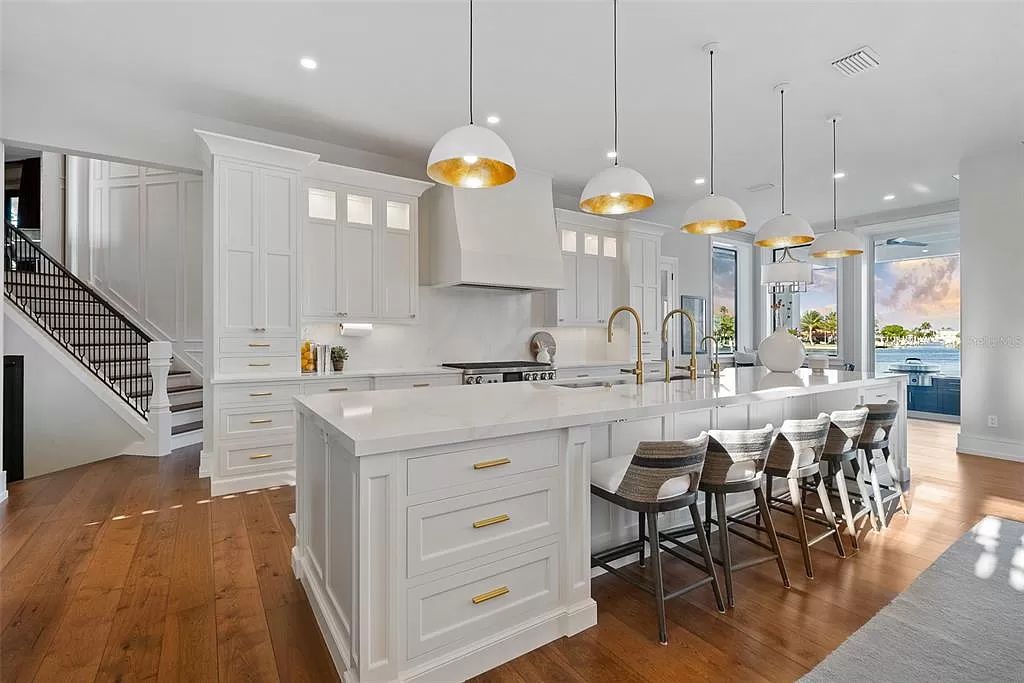 The Home in Holmes Beach is a luxurious, sprawling waterfront front estate tucked away at the end of a quiet cul de sac on desirable Anna Maria Island now available for sale. This home located at 535 70th St, Holmes Beach, Florida