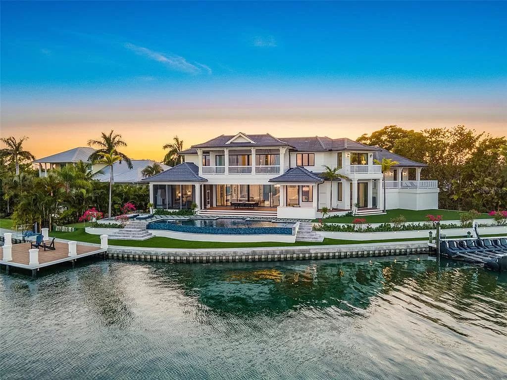 The Home in Holmes Beach is a luxurious, sprawling waterfront front estate tucked away at the end of a quiet cul de sac on desirable Anna Maria Island now available for sale. This home located at 535 70th St, Holmes Beach, Florida
