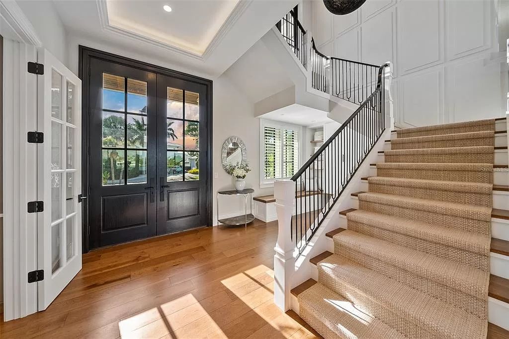 The Home in Holmes Beach is a luxurious, sprawling waterfront front estate tucked away at the end of a quiet cul de sac on desirable Anna Maria Island now available for sale. This home located at 535 70th St, Holmes Beach, Florida