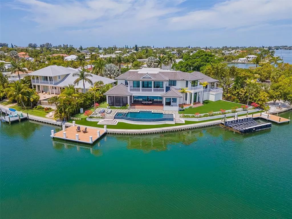 The Home in Holmes Beach is a luxurious, sprawling waterfront front estate tucked away at the end of a quiet cul de sac on desirable Anna Maria Island now available for sale. This home located at 535 70th St, Holmes Beach, Florida