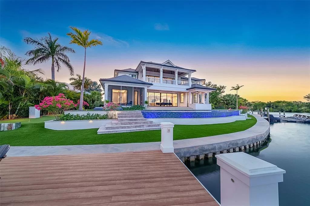 The Home in Holmes Beach is a luxurious, sprawling waterfront front estate tucked away at the end of a quiet cul de sac on desirable Anna Maria Island now available for sale. This home located at 535 70th St, Holmes Beach, Florida