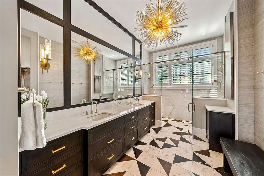 The Home in Holmes Beach is a luxurious, sprawling waterfront front estate tucked away at the end of a quiet cul de sac on desirable Anna Maria Island now available for sale. This home located at 535 70th St, Holmes Beach, Florida