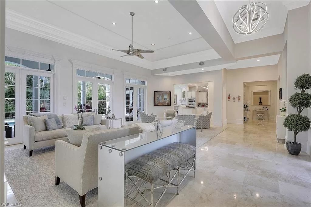 The Home in Naples is a newly renovated estate surrounded by lush tropical landscaping in the quintessential Naples neighborhood of Coquina Sands now available for sale. This home located at 1675 Murex Ln, Naples, Florida