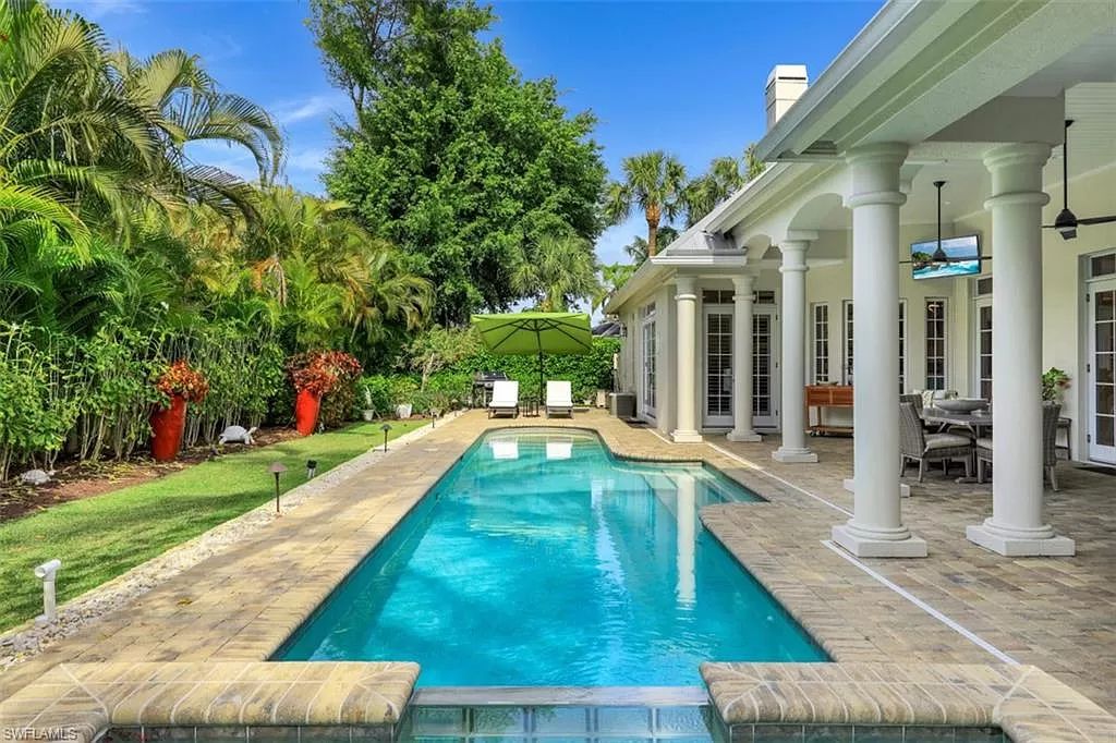 The Home in Naples is a newly renovated estate surrounded by lush tropical landscaping in the quintessential Naples neighborhood of Coquina Sands now available for sale. This home located at 1675 Murex Ln, Naples, Florida