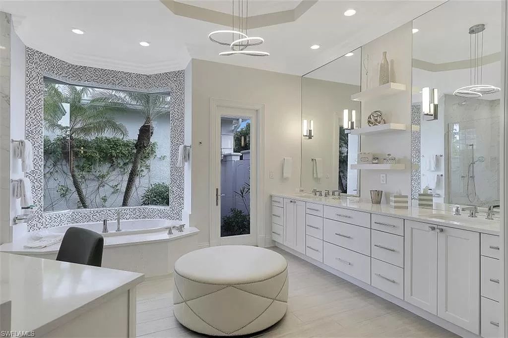 The Home in Naples is a newly renovated estate surrounded by lush tropical landscaping in the quintessential Naples neighborhood of Coquina Sands now available for sale. This home located at 1675 Murex Ln, Naples, Florida