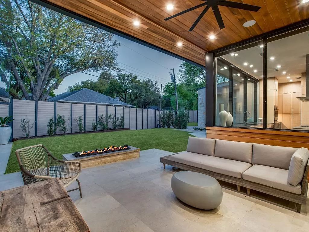 The Home in Dallas is a modern masterpiece features high-end luxury design and custom details including custom dry stacked stone, custom metal gutters, metal roof now available for sale. This home located at 5736 Stonegate Rd, Dallas, Texas