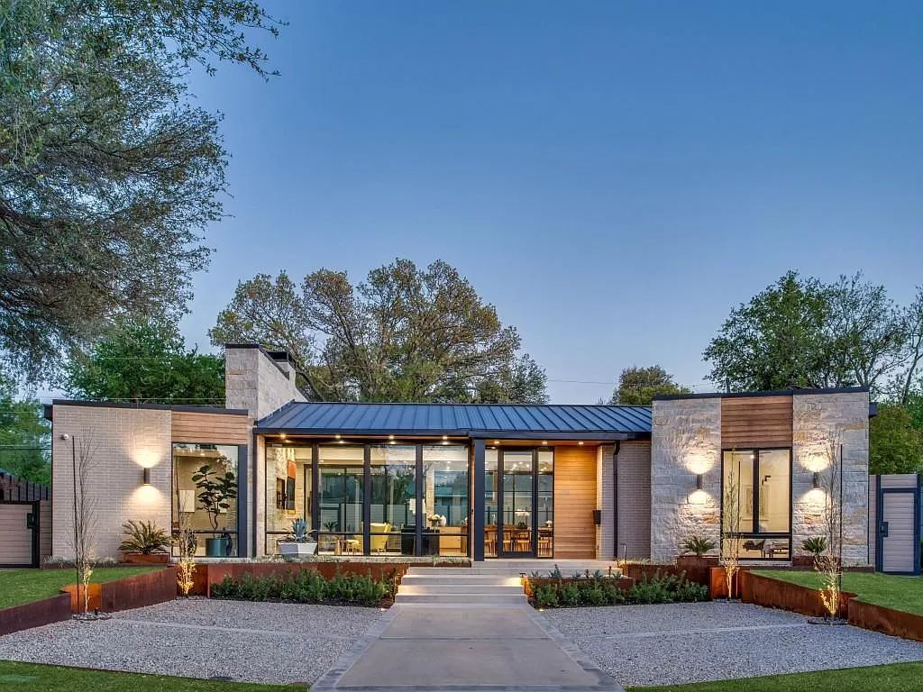 The Home in Dallas is a modern masterpiece features high-end luxury design and custom details including custom dry stacked stone, custom metal gutters, metal roof now available for sale. This home located at 5736 Stonegate Rd, Dallas, Texas