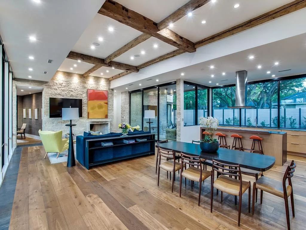 The Home in Dallas is a modern masterpiece features high-end luxury design and custom details including custom dry stacked stone, custom metal gutters, metal roof now available for sale. This home located at 5736 Stonegate Rd, Dallas, Texas