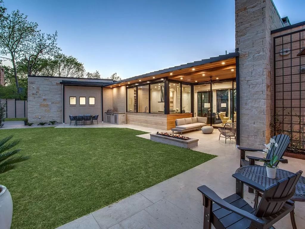 The Home in Dallas is a modern masterpiece features high-end luxury design and custom details including custom dry stacked stone, custom metal gutters, metal roof now available for sale. This home located at 5736 Stonegate Rd, Dallas, Texas