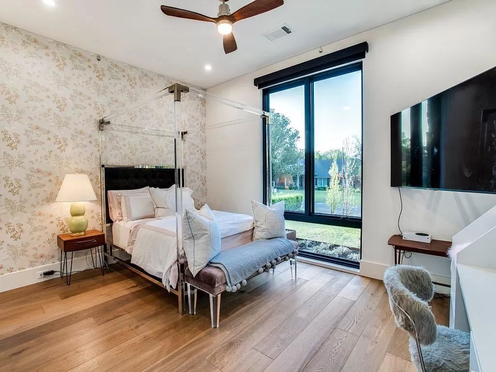 The Home in Dallas is a modern masterpiece features high-end luxury design and custom details including custom dry stacked stone, custom metal gutters, metal roof now available for sale. This home located at 5736 Stonegate Rd, Dallas, Texas