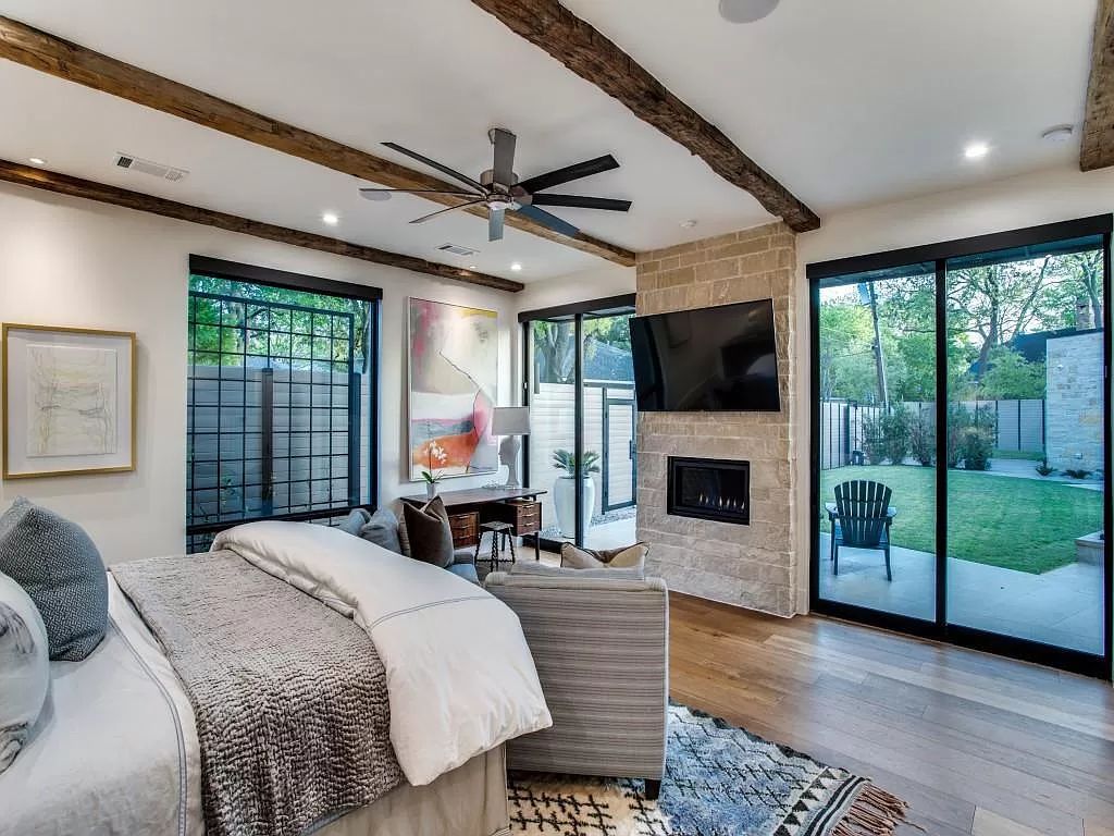 The Home in Dallas is a modern masterpiece features high-end luxury design and custom details including custom dry stacked stone, custom metal gutters, metal roof now available for sale. This home located at 5736 Stonegate Rd, Dallas, Texas