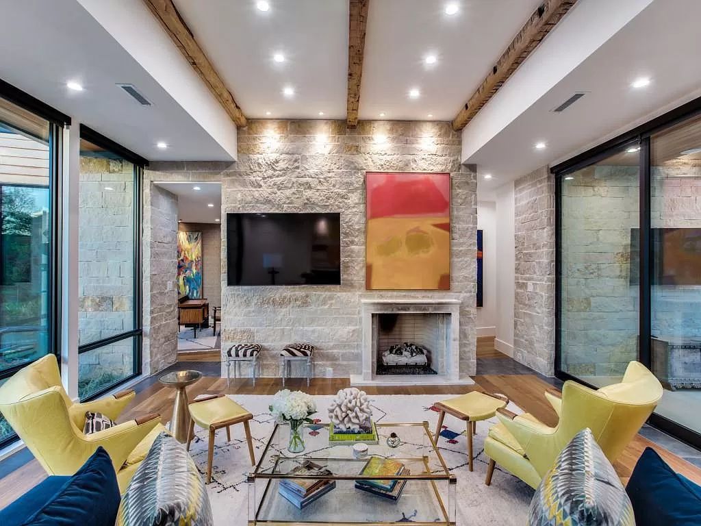 The Home in Dallas is a modern masterpiece features high-end luxury design and custom details including custom dry stacked stone, custom metal gutters, metal roof now available for sale. This home located at 5736 Stonegate Rd, Dallas, Texas