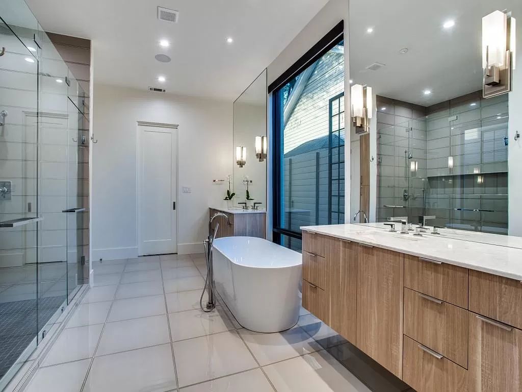 The Home in Dallas is a modern masterpiece features high-end luxury design and custom details including custom dry stacked stone, custom metal gutters, metal roof now available for sale. This home located at 5736 Stonegate Rd, Dallas, Texas